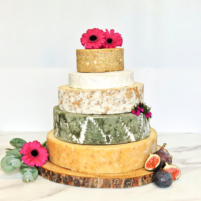A Toast to Taste: Perfecting Cheese Wedding Cakes with Wine Pairings